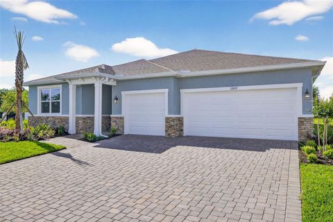 Photo of 12459 49th Street E, Parrish, FL 34219 (MLS # TB8441541)