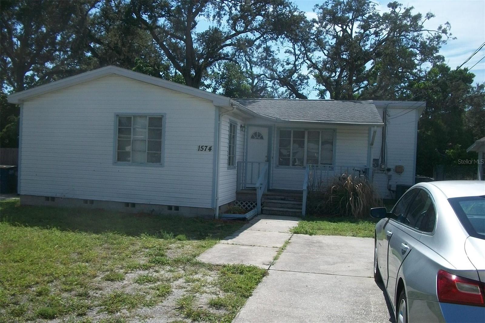 Clearwater, 3 Bedroom, 2 Bath Patio deck in the front and one in the back overlooking partially fence backyard,