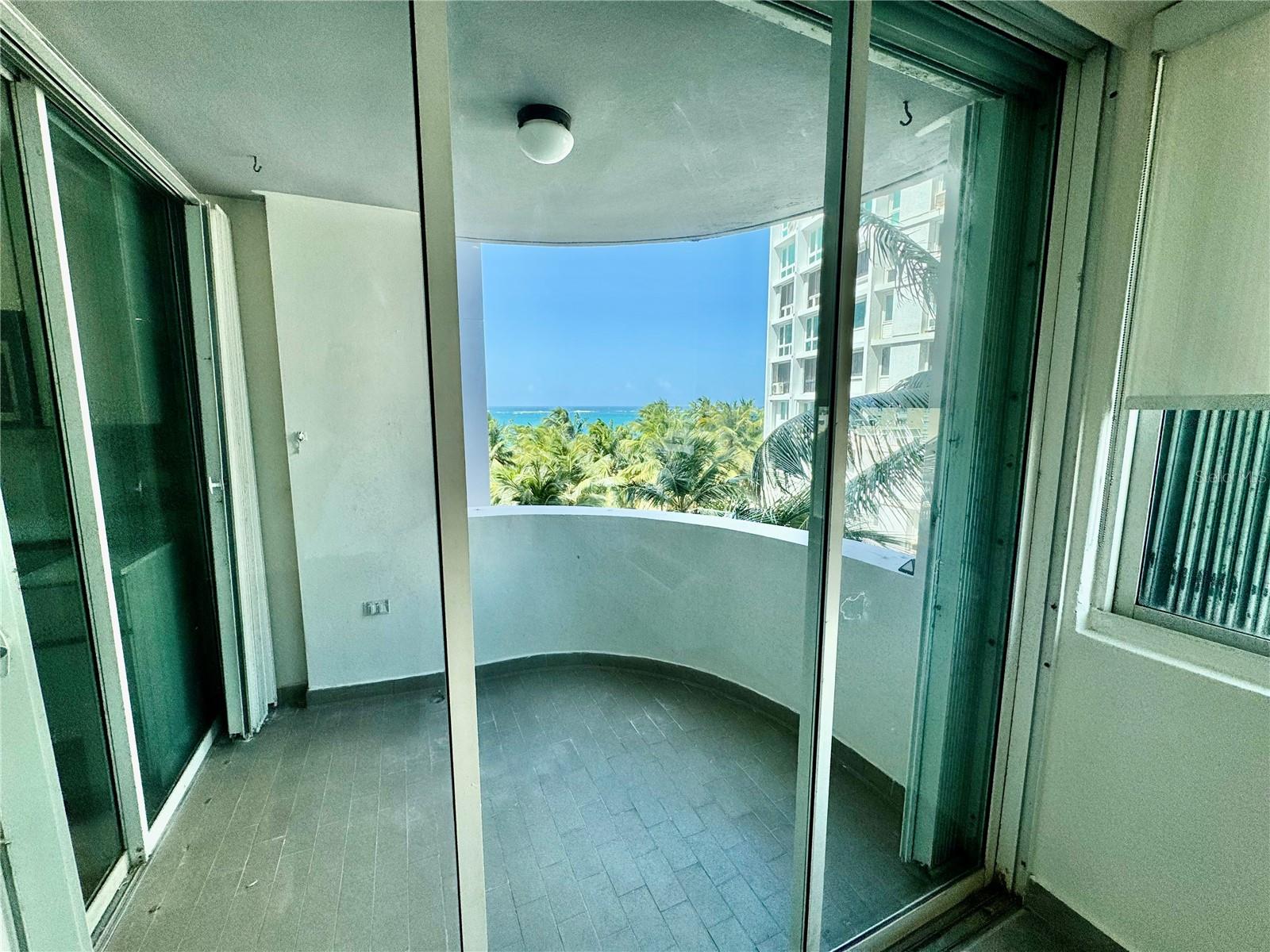 Kings Court Playa an oceanfront building located in one of Puerto Rico’s preferred beaches in the San Juan area. The apartment has two on suite bedrooms convertible to three bedrooms and a half bathroom. It enjoys a lovely terrace with ocean views that connects to the living room and kitchen. Enjoying 1884 square feet this lovely apartment has plenty of room to make it your own. This is a walkable area were you will see everyone coming and going. Walk to Loiza street to a variety of restaurants, pharmacy, convenience stores gas station, laundry banks and more. Easy access to mayor highways. The unit enjoys two parking spaces. But most importantly your new home will let you enjoy the best beach in the area. HOA 734.00 Hazard 5920.50 Taxes 3118.20