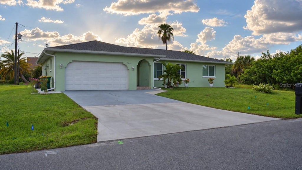 Photo of 266 Warwick Street NW, Port Charlotte, FL 33952 (MLS # A4706802)