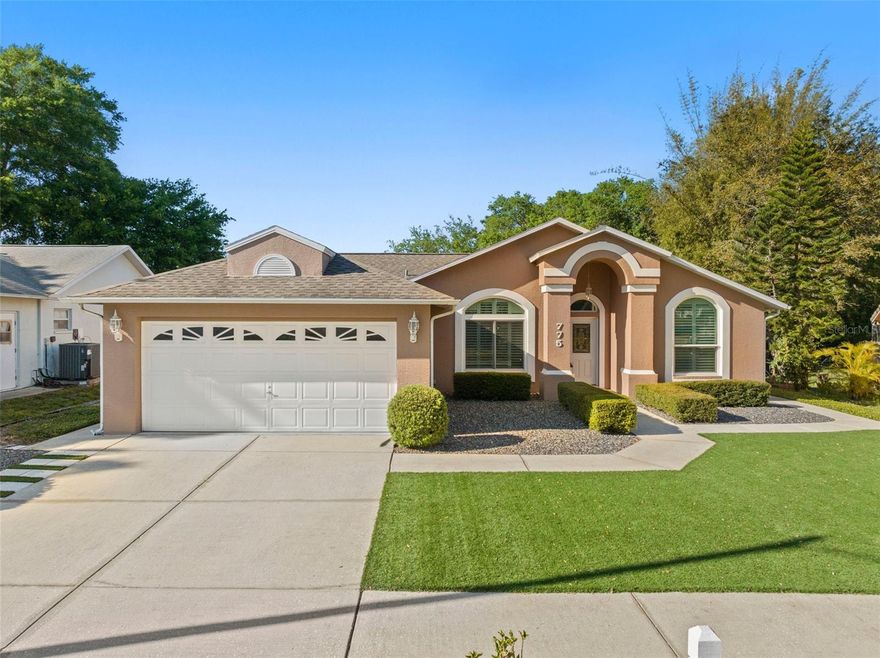 Welcome to the Brittany Park community in northern Tarpon Springs. This quaint neighborhood is the location of this turnkey 3-bedroom, 2-bathroom pool home. Inside you will walk on classy and genuine real wood Brazilian cherry floors under your feet and high, vaulted ceilings overhead. In the kitchen, overlooking your screened in pool enclosure, you'll find soft-close drawers, granite countertops, an eating area, and a true dining area to start and end each day with friends and family. The primary bedroom features a walk-in en-suite bathroom with walk-in closets. The second and third bedrooms are located on the opposite side of the home and share the second bathroom in the hallway. In your private backyard pool, enjoy the freshly painted pool deck complete with privacy bushes all around. The backyard has been tastefully landscaped and the entire home is low-maintenance. You'll notice the home corners a large wooded area - perfect for dampening noise and adding peace to your day. This property deserves an in-person viewing to appreciate all the attributes - schedule your showing today!