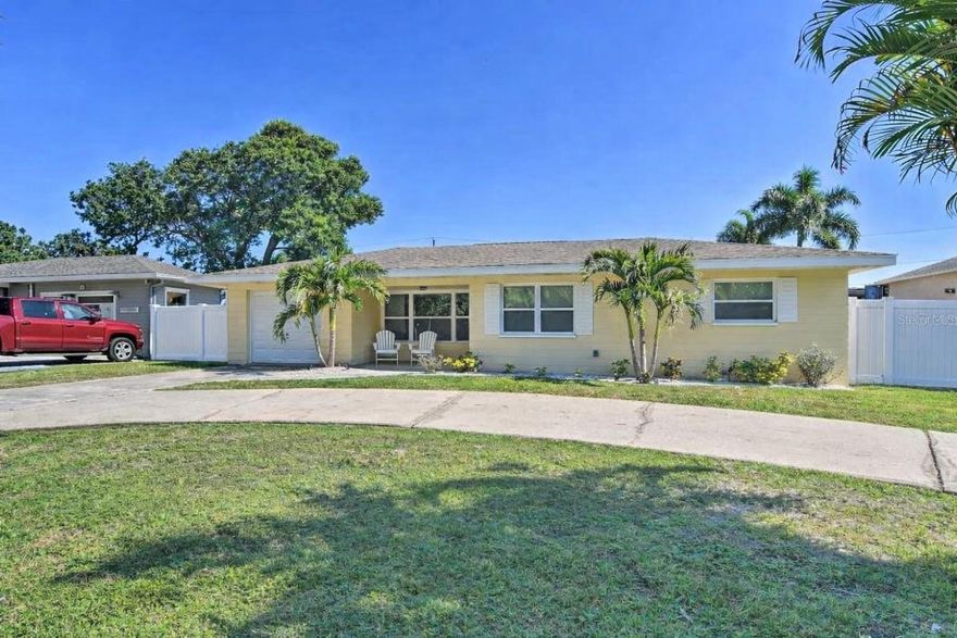 One or more photo(s) has been virtually staged. Welcome to this beautifully updated 2-bedroom, 2-bathroom home located in a NON-FLOOD ZONE, offering comfort, style, and peace of mind. This property features NO HOA, giving you added flexibility and freedom. From the moment you arrive, you'll notice the huge circular driveway, providing ample parking and excellent curb appeal.

Inside, the home offers a bright open-concept layout filled with natural light. The spacious living and dining areas flow effortlessly into the stunning kitchen, which features solid wood cabinetry, stone countertops, modern appliances, and plenty of prep and storage space, making it perfect for both everyday living and entertaining.

Step outside through the glass door to your expansive oversized backyard fully enclosed with white vinyl fencing, offering privacy and plenty of room to relax or host gatherings. The new paver patio is ideal for outdoor dining, entertaining guests, or simply enjoying Florida’s beautiful weather. The yard is also large enough to add the pool of your dreams.

The home also includes an oversized garage with durable epoxy floors, making it perfect for extra storage, a workshop, or even a home gym.

Conveniently located just minutes from Seminole City Center, you'll have quick access to fantastic shopping, dining, and entertainment, while the beautiful Gulf beaches are only a short drive away, giving you the best of Florida’s coastal lifestyle.

This move-in ready home has been thoughtfully upgraded and is ready for its next owner.

Recent Updates Include:
NEW ROOF 2026 | NEW WINDOWS 2024 | NEW INSULATION 2023 | NEW KITCHEN 2023 | NEW APPLIANCES 2023 | NEW PAINT & FLOORING 2023 | NEW WASHER & DRYER 2025 | NEW SOFFIT AND FASCIA 2024 | NEW FENCE 2022

Don’t miss the opportunity to own this beautifully updated home in an incredible location—schedule your showing today before it’s gone!