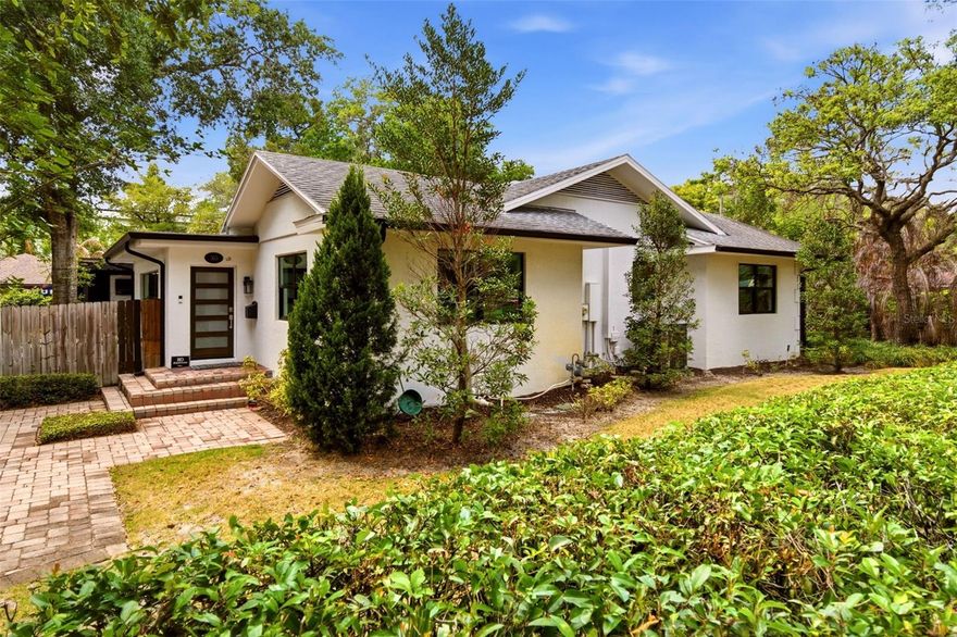 This light and bright, single-story, almost 3,000 square foot pool home features a split plan with four full bedrooms and three full baths. Your guests will immediately appreciate the expansive paver driveway, which allows easy, off-street parking. Once inside, they will admire the abundance of natural light provided by the new, large-format windows. Not only do the new windows (2022) illuminate the interior space, but they are also impact-resistant, energy-efficient, noise-reducing, and offer UV protection. The interior renovation was designed with minimal barriers between living areas, creating open, fluid spaces that enhance day-to-day living. The bedroom and bathroom layout is ideal, offering maximum privacy: two large bedrooms share one full bathroom on one side of the house, another bedroom with an en-suite bathroom is at the center, and the primary bedroom and bathroom are on the other side. Wood or natural stone flooring, extensive millwork, vaulted ceilings, new paint, updated lighting fixtures, and new fans enhance the spaces throughout. The kitchen was renovated to include an oversized, under-mount farmhouse sink, commercial-grade faucet, new LED lighting, and quartz countertops with a waterfall edge. The primary suite was updated by a former owner but was renovated by the current owner to add a second walk-in closet with custom organization. All bathrooms received light renovations, ranging from hardware and paint to new fixtures or vanities and countertops. In addition to the visually appealing renovations, the roof was replaced in 2019 and the house was re-plumbed in 2020. The outdoor improvements may be the most valued, as they created endless opportunities for outdoor living and entertaining on the newly constructed deck and enhanced landscape. All of the outdoor living benefits Florida provides are available here. A natural gas line was brought to the house as part of the renovation, allowing for easy future modifications such as a tankless gas-fueled water heater or gas-fueled outdoor grill. Located just one and a half miles from the notable retail stores and restaurants of Park Avenue and within a well-graded public school zone, there is nothing you won’t love about this home or its location.