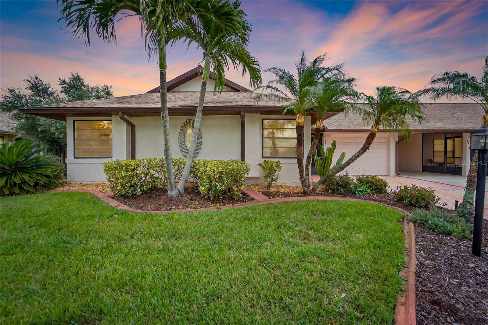 Please call Michelle Thompson at (813) 692-5982 for more information on this home.
Welcome to 1713 Atrium Dr, a beautifully updated rental home located in the sought-after 55+ Cypressview community in Sun City Center. This home offers modern upgrades, a bright open layout, and private garden spaces perfect for relaxing and enjoying the Florida lifestyle.
From the moment you arrive, you’ll notice the professionally landscaped yard, screened-in front porch, and leaded glass entry door that adds charm and curb appeal. Inside, volume ceilings in the living and dining areas create an open and airy feel.
The kitchen and dining room flow together in an open-concept design featuring granite countertops, hardwood cabinets with pull-out drawers, dimmable LED lighting, and KitchenAid stainless steel appliances, including a double oven.
Just off the kitchen, the large pantry and laundry room offer quartz countertops, ample storage, a full-size stackable washer and dryer, and a laundry sink for convenience.
The living room opens to a bright, air-conditioned den overlooking private wrap-around gardens—ideal for relaxing, hobbies, or a home office.
The spacious primary bedroom easily fits king-size furniture and features a custom walk-in closet and a beautifully updated ensuite with a double vanity, granite counters, modern lighting, and a bonus undercounter fridge. The guest bath includes a walk-in tiled shower and a comfort-height toilet.
Enjoy Florida’s weather from the screened-in rear porch, surrounded by blooming jasmine, a Meyer lemon tree, an olive tree, and a fully fenced garden for privacy.
This rental offers low-maintenance living with lawn care included and all the comfort and convenience of a 55+ community lifestyle.
Don’t miss your chance to rent this move-in ready, beautifully upgraded home at 1713 Atrium Dr. Schedule your private showing today!
Application fee is $80/ person. Upon acceptance a tenant processing fee of $125.00, $50 Pet Processing Fee will be due at move in, in addition to any rent and or security deposit. Non-refundable Pet Fee: $350, Pet Rent: $50/pet/month.