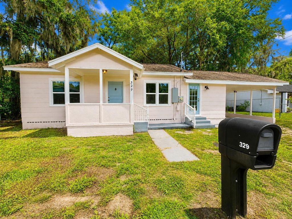 Photo of 329 S Osceola Street, Deland, FL 32724 (MLS # O6412249)
