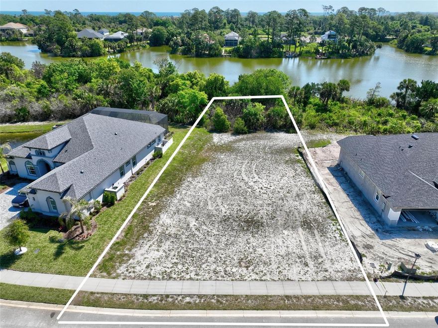 Build your dream home on this beautiful lakefront lot located at 128 N Lakewalk Drive in Palm Coast, FL. Boasting an impressive 89 feet of frontage, this property offers expansive water views and plenty of space to design a custom residence that takes full advantage of its serene setting....... SOIL TEST AND SURVEY ARE AVAILABLE ON FILE.
Situated in the desirable community of Palm Coast Plantation, the lot faces a peaceful preserve across the street, ensuring added privacy and a natural backdrop both front and back. Whether you’re enjoying sunrise over the water or the quiet beauty and added privacy of the preserved landscape, this homesite delivers a rare combination of openness and tranquility.
Residents of this sought-after neighborhood enjoy access to a variety of amenities, enhancing both lifestyle and convenience. Amenities included are: Large community pool, Tennis/pickle-ball courts, fishing dock on the Intracostal Waterway and storage for boats and RV's. With its prime location, generous frontage, and picturesque surroundings, this is a unique opportunity to create your ideal Florida retreat.
Don’t miss your chance to own a premium homesite in one of Palm Coast’s most sought after communities.