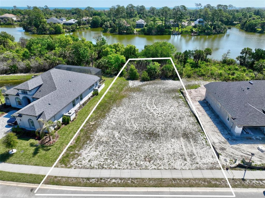 Photo of 128 N Lakewalk Drive, Palm Coast, FL 32137 (MLS # FC317875)