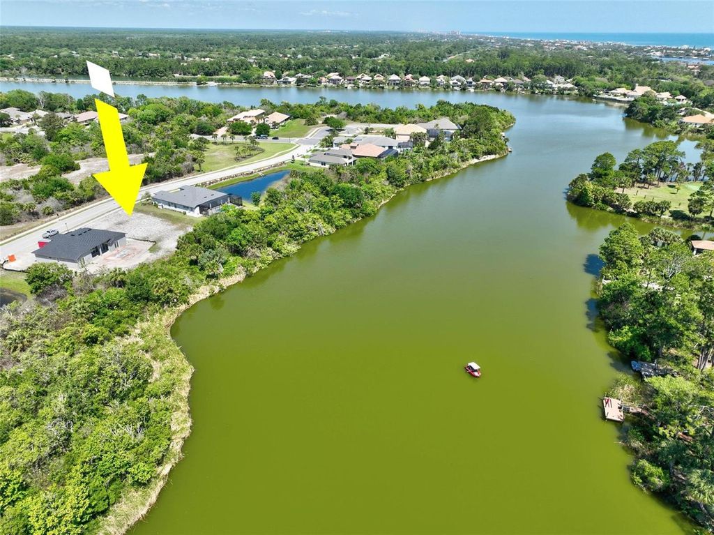 Photo of 128 N Lakewalk Drive, Palm Coast, FL 32137 (MLS # FC317875)