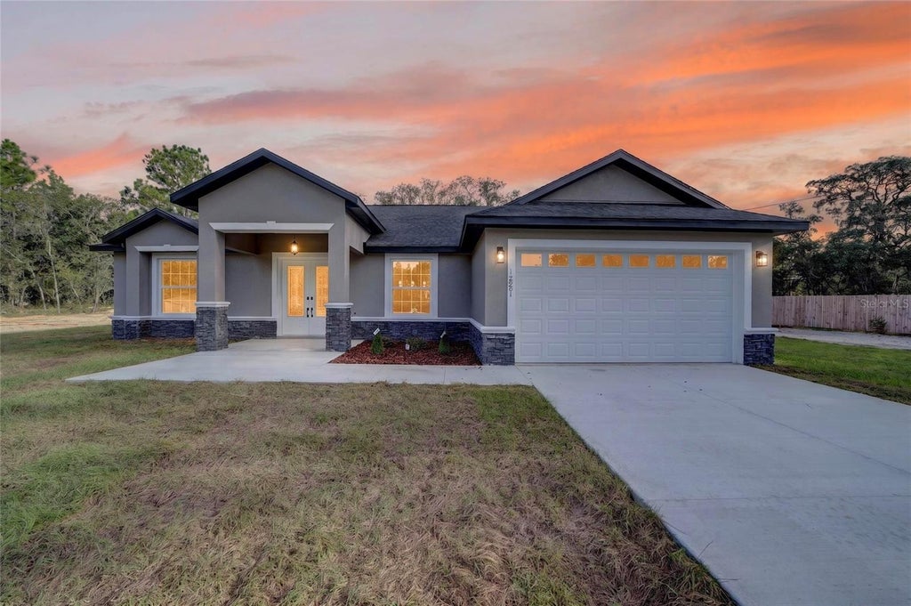 Photo of 12201 SW 90th Place, Dunnellon, FL 34432 (MLS # OM732542)