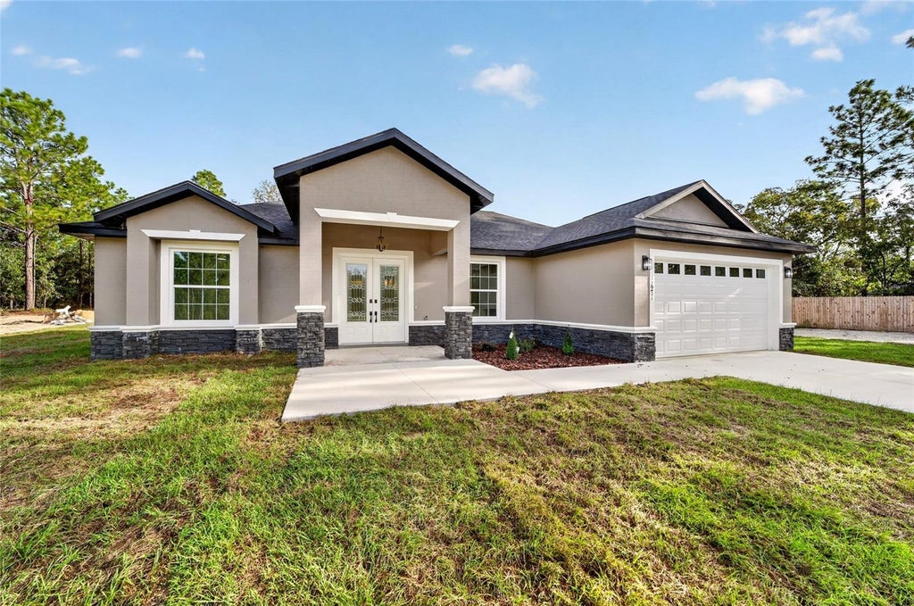 Photo of 12201 SW 90th Place, Dunnellon, FL 34432 (MLS # OM732542)