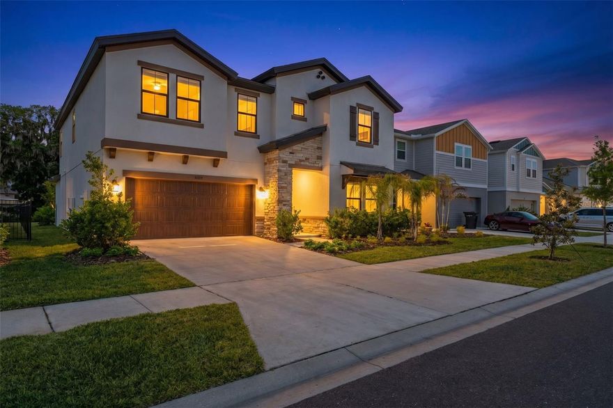 Move-in ready and built for the way families actually live. This 2024 Homes by WestBay Pelican — 5 bedrooms, 3 full baths, 3,442 sq ft — is barely a year old with every upgrade already done. No construction wait. No builder delays. Just walk in and start living. The main level flows effortlessly from the grand room through the chef's kitchen and sun-filled café to the covered lanai through an expansive 16-foot sliding glass door. Sonoma Linen cabinetry, Frost MSI quartz countertops, a professional gas appliance package, and luxury vinyl plank flooring set the tone. A first-floor bedroom and full bath provide flexibility for guests, in-laws, a home office or a gym. Upstairs, the owner's retreat is tucked privately at the rear — walk-in shower, soaking tub, and generous walk-in closet. Three additional bedrooms and a large bonus room occupy the opposite side, giving everyone their own space. Thoughtful upgrades throughout: 8-foot main-level doors, square headers, tankless gas water heater, quartz in every room, and a $25,000 design center package already invested into the finishes. The backyard is a blank canvas — fully sodded and irrigated. Pool, summer kitchen, gazebo or wide-open green space; it's ready for your vision. Hawkstone offers resort-style amenities and is zoned for A-rated Fishhawk Creek Elementary, Barrington Middle, and Newsome High. Just outside your door: the 969-acre Triple Creek Nature Preserve, Triple Creek BMX, Lithia Springs Park with crystal-clear spring swimming, Alderman's Ford for kayaking, and the FishHawk Aquatic Center. Minutes to US-301 and I-75 for an easy commute anywhere in Tampa Bay. Everything is new. Everything is under warranty. And unlike new construction, there's no 8-month wait — just a closing date and a set of keys.