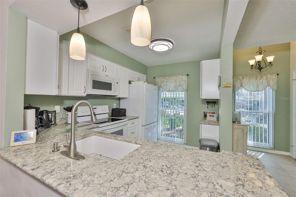 Photo of 311 Knottwood Court, Sun City Center, FL 33573 (MLS # TB8391183)