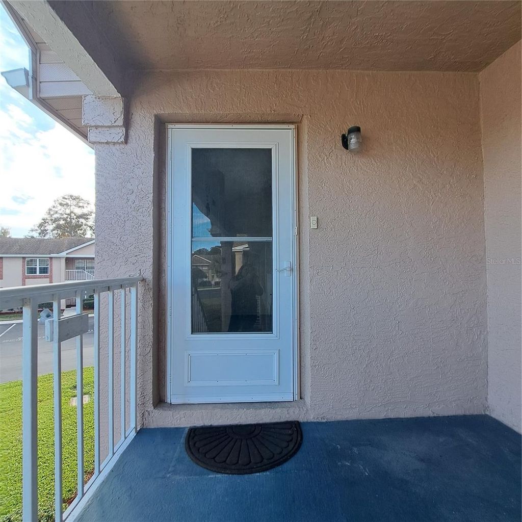 Photo of 4739 Myrtle Oak Drive #21, New Port Richey, FL 34653 (MLS # TB8456559)