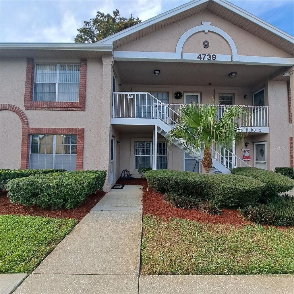 Photo of 4739 Myrtle Oak Drive #21, New Port Richey, FL 34653 (MLS # TB8456559)