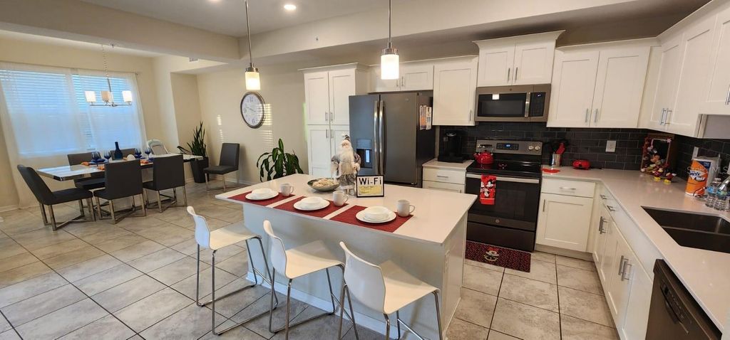 Photo of 3150 Paradox Circle #302, Kissimmee, FL 34746 (MLS # O6368790)