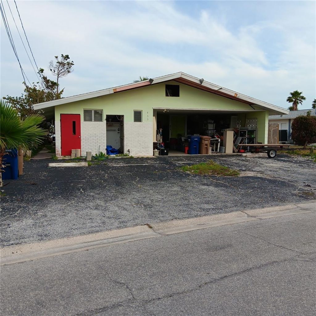 Photo of 439 129th Avenue E, Madeira Beach, FL 33708 (MLS # TB8449117)