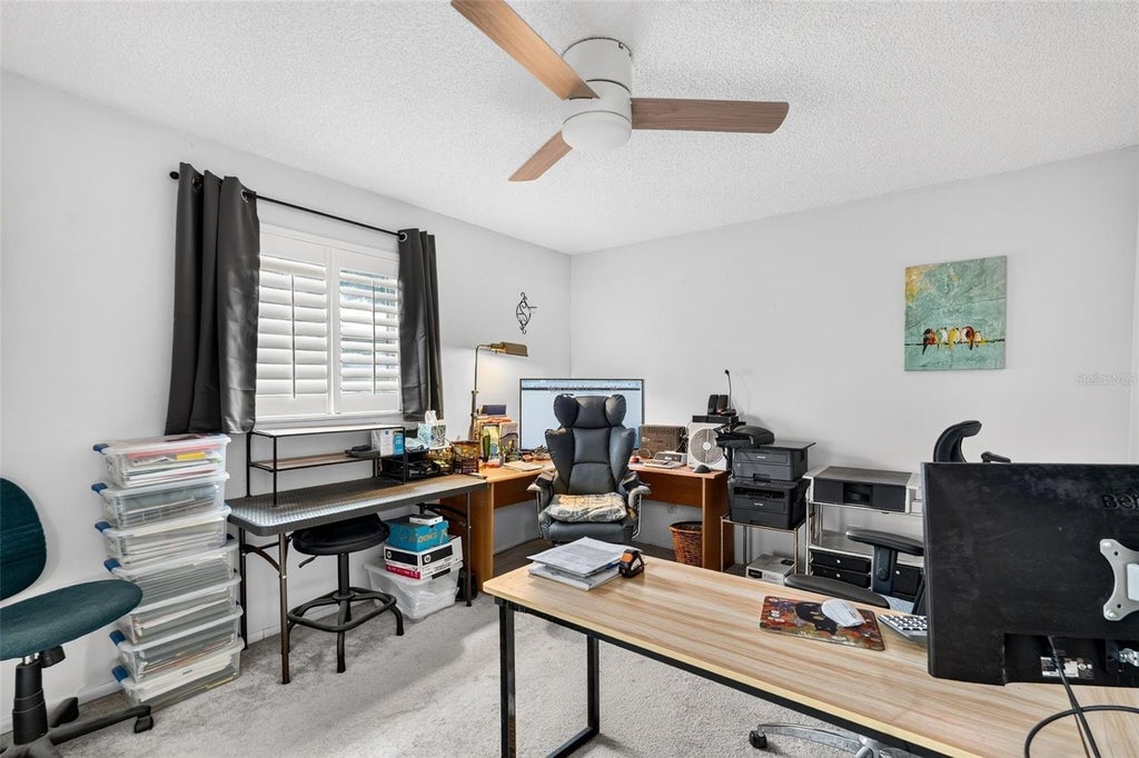 Photo of 7283 Eleanor Circle, Sarasota, FL 34243 (MLS # A4705601)