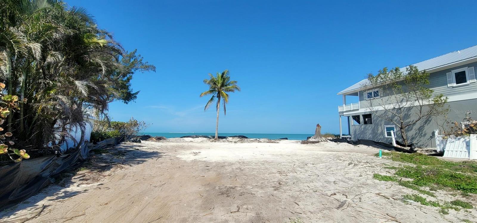 LIVE ON THE BEACH!! AMAZING LOCATION. SELLER IS SELLING BOTH LOTS TOGETHER. DOUBLE LOT! LOTS 24 AND 25. BOTH FULLY APPROVED TO BUILD. Rare opportunity to build single family home with a POOL directly on Bay on the North End of Anna Maria Island with spectacular views of Sunshine Skyway Bridge! This amazing Location is 15 homes away from Rod and Reel Pier! Imagine building your dream vacation home watching dolphins and manatees play as you watch the sunrise with your morning coffee in your own back yard.