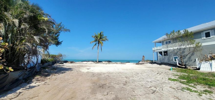 LIVE ON THE BEACH!! AMAZING LOCATION. SELLER IS SELLING BOTH LOTS TOGETHER. DOUBLE LOT! LOTS 24 AND 25. BOTH FULLY APPROVED TO BUILD. Rare opportunity to build single family home with a POOL directly on Bay on the North End of Anna Maria Island with spectacular views of Sunshine Skyway Bridge! This amazing Location is 15 homes away from Rod and Reel Pier! Imagine building your dream vacation home watching dolphins and manatees play as you watch the sunrise with your morning coffee in your own back yard.