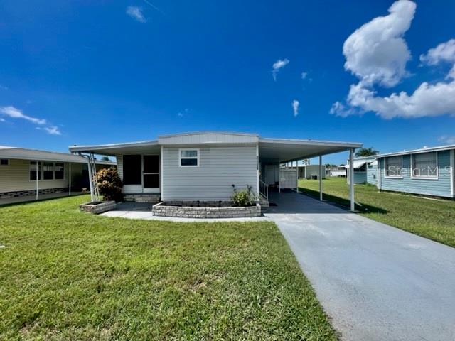 WELCOME TO YOUR HOME SWEET HOME at 10819 London Dr, Port Richey in the gated community of Senate Manor, a 55+ cooperative community in SUNNY Florida. This 1972 SUPERB 2 bedrooms + large FL room, 1 bathroom mobile home lies on a nice lot with just under 5,000 sqft in a NO CDD zone. Key exterior features are covered front porch where you can meet & greet your neighbors, 3 entrances into the home, rain gutters, updated windows with shade shutters for storm protection, carriage lights & easy-breezy TROPICAL landscaping that is taken care of for you. AMAZING features are NEWER ROOF (installed 8/2024), updated electrical panel (2001 permit), oversized carport for your vehicle & golf cart & stone skirting around the perimeter to prevent unwanted critters. When you step inside, you'll LOVE the OPEN FLOOR PLAN consisting of the eat-in-kitchen, living & dining rooms & SPACIOUS lanai/Florida room. Add a portable AC unit or mini-split & this LOVELY Florida room can easily increase the square footage by 160 sqft. The WONDERFUL eat-in kitchen features a double stainless steel sink with gooseneck faucet with window view, pantry closet, plentiful cabinets with hardware, CUTE corner nook with extra cabinets for storage, expansive counters & NICE backsplash in WARM TONES. The living room has raised ceilings, PRETTY laminate wall in a herringbone pattern, fan & floors dressed in durable laminate for easy breezy maintenance. The primary bedroom can fit queen furniture, has dual closets & a built-in study area. The second bedroom with closet & built-in desk is a PERFECT guest spot or transform it into your office/craft room or personal library. The generous-sized, updated bathroom features sink, vanity, newer toilet, lots of counter space, wall sconces, bead board feature wall, framed mirror & step-in shower with shelves. The 2-in-1 washer & dryer machine is also located in the bathroom & INCLUDED in the sale. AWESOME IMPROVEMENTS include: Replacement of 12 windows & 3 doors with permits 5/2024, 3 NEW MINI-SPLIT AC/HEAT SYSTEMS (both bedrooms & living room), plywood subfloors & new flooring & new baseboards. Storm surge water did not enter the main living part of the home but the community of Senate Manor did experience storm surge from Helene. The CONVENIENT storage shed with additional laundry hookups is great for your garden tools or beach gear. Senate Manor is a GLORIOUS RESIDENT-OWNED 55+ COMMUNITY & included in the low HOA fee of $200/month is trash with recycling pick-up 2X week, all exterior lawn maintenance, water, sewer, street lights, water with fountain views, gates & recreational activities like HEATED POOL & SPA, shuffleboard, horseshoes & gym. There is optional storage for boats, RVs or trailers on site. Location is IDEAL near beaches, shopping, restaurants, medical plazas, places of worship & tourist attractions. This STELLAR, move-in ready home is sold FURNISHED for immediate enjoyment for the lucky new buyers! MAKE THIS YOUR FUTURE HOME!