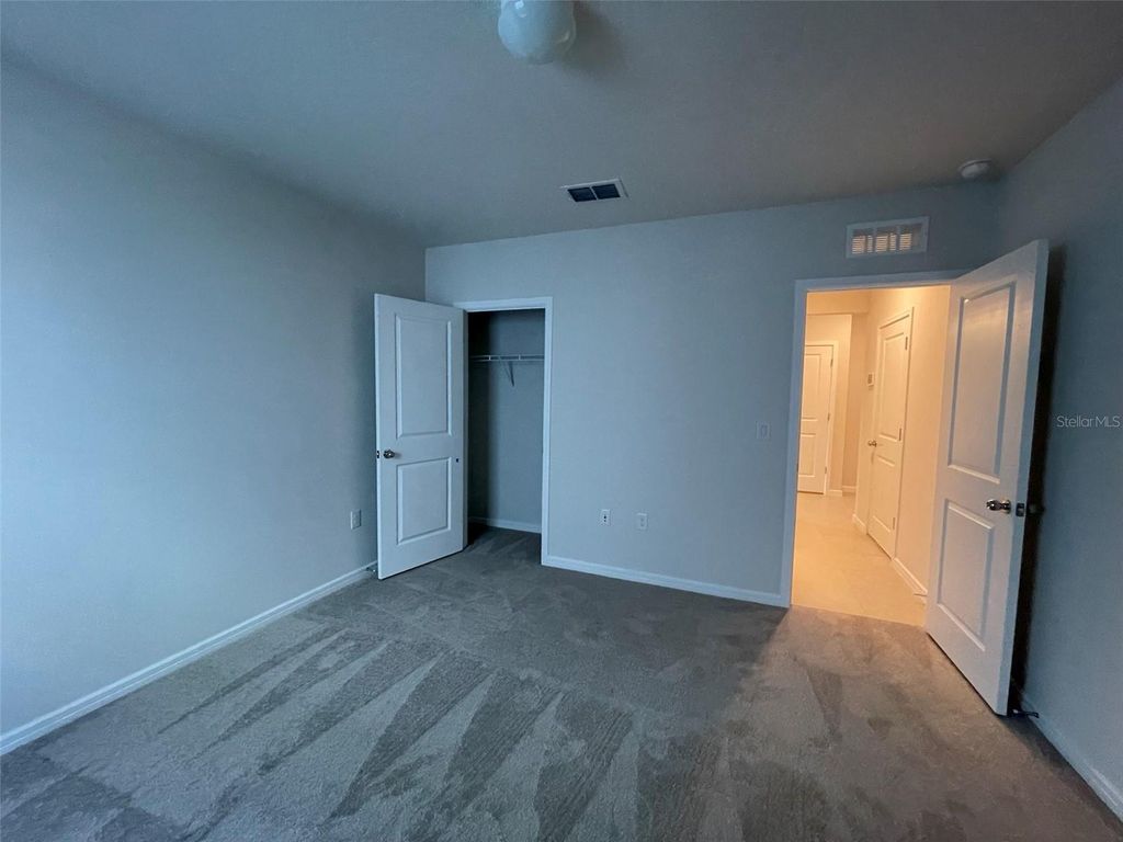 Photo of 9675 Rally Spring Loop, Wesley Chapel, FL 33545 (MLS # TB8442244)