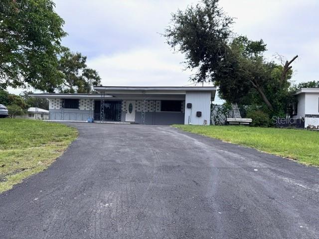 Large home on a corner lot with a circular driveway for Rent in St. Petersburg. Large backyard, fenced in.