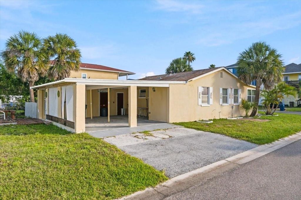 Photo of 13104 4th Street E, Madeira Beach, FL 33708 (MLS # TB8520814)