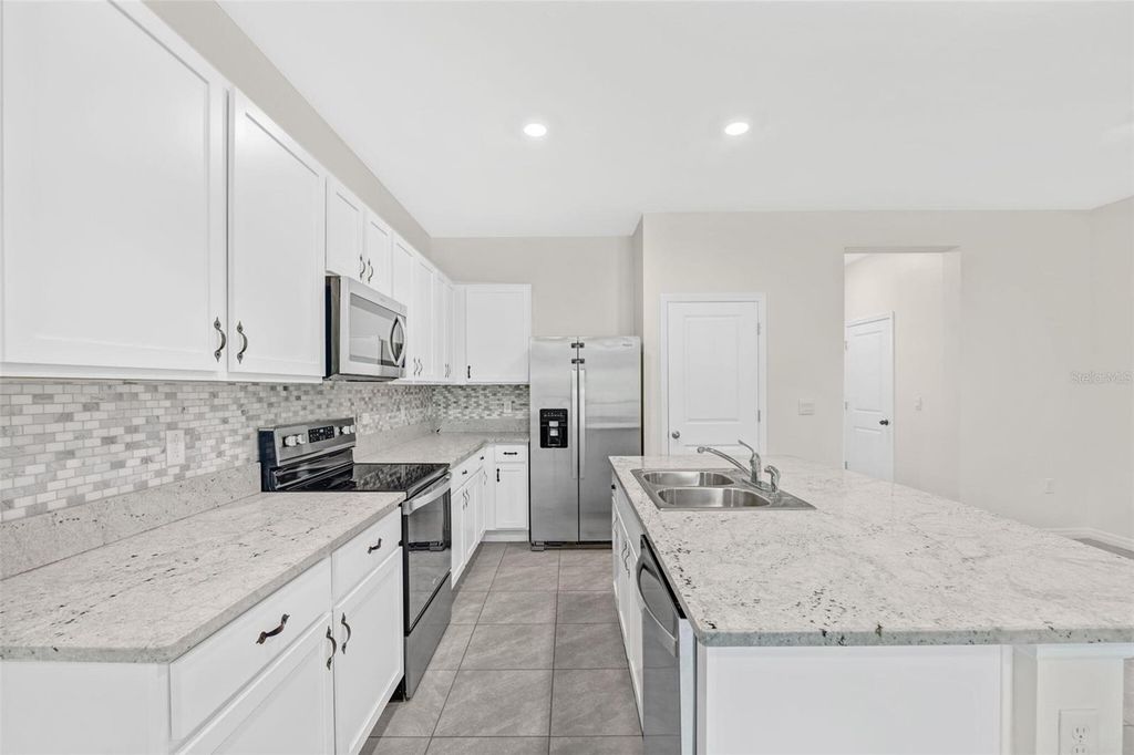 Photo of 5068 Captain Davis Drive, Wimauma, FL 33598 (MLS # O6347892)