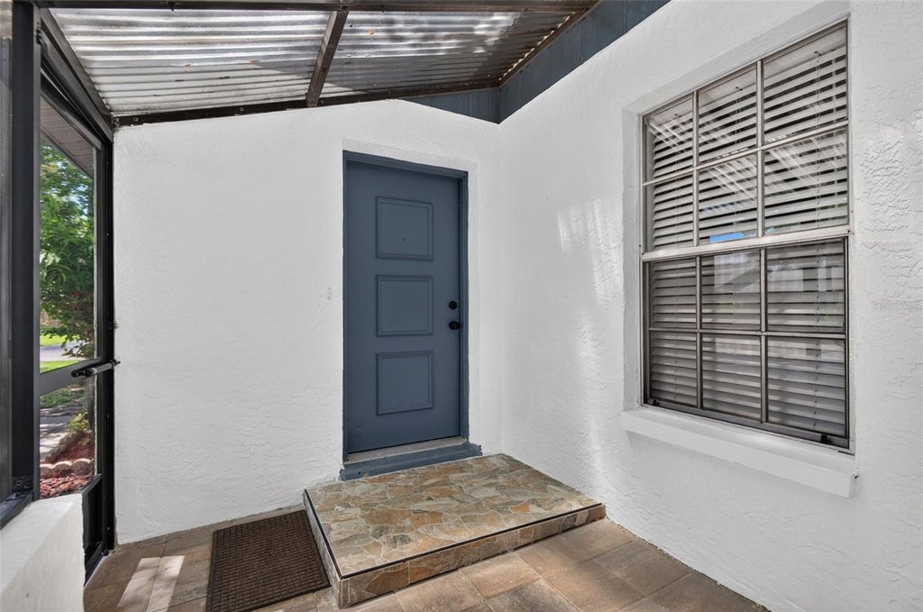 Photo of 7347 Parkside Villas Drive, St Petersburg, FL 33709 (MLS # TB8547883)