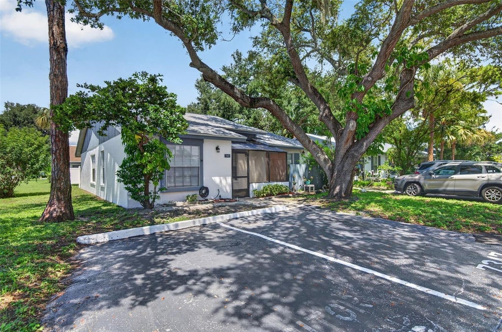 Photo of 7347 Parkside Villas Drive, St Petersburg, FL 33709 (MLS # TB8547883)