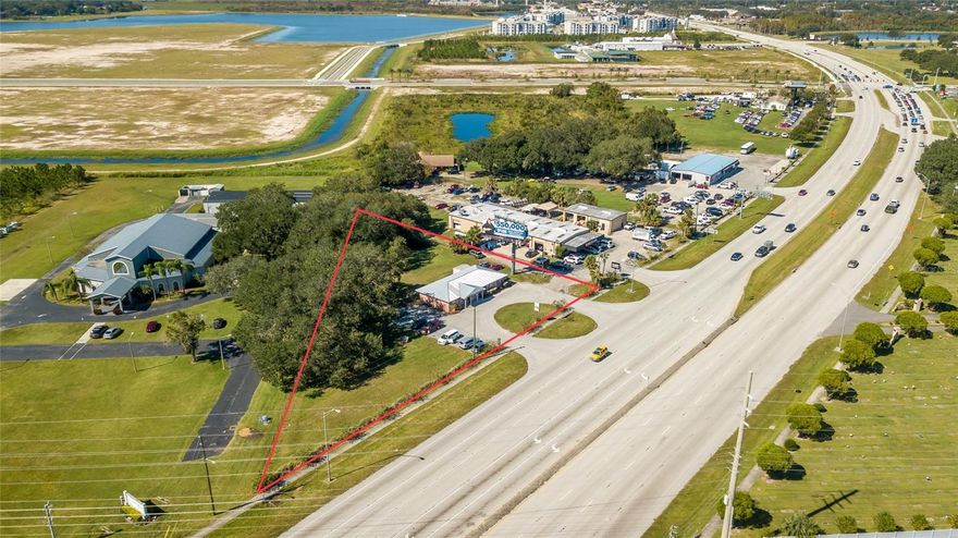 Frontage commercial property with exceptional exposure, ideally positioned along US-192 just outside the entrance to NeoCity and directly across from Osceola Heritage Park, a 210-acre entertainment and sports complex undergoing significant redevelopment. Surrounded by ongoing growth and sitting on over an acre, this site offers strong long-term value for redevelopment or owner-user opportunities.  

Osceola Heritage Park is currently the focus of a major transformation planned through 2025 and beyond.  A proposed $1 billion plus mixed-use sports and entertainment district, envisions a hotel, additional soccer fields, medical campus, commercial space, residential units, parking structures, and entertainment venues. Construction could begin as early as late 2025, positioning the area as a future national and international destination for sports, tourism, and community events.

Property Highlights:

• 1,980 SF Office Building
• 120 days to occupancy
• Prime frontage on US-192 with easy access to Florida’s Turnpike
• Located in a rapidly developing corridor with significant public and private investment

With major redevelopment underway across the street and continuous momentum in the surrounding market, this property offers exceptional visibility, steady income, and strong future potential.