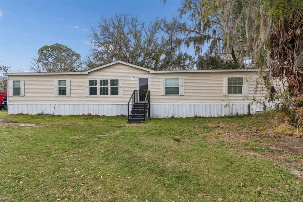 Photo of 27435 Holiday Drive, Dade City, FL 33525 (MLS # TB8483184)