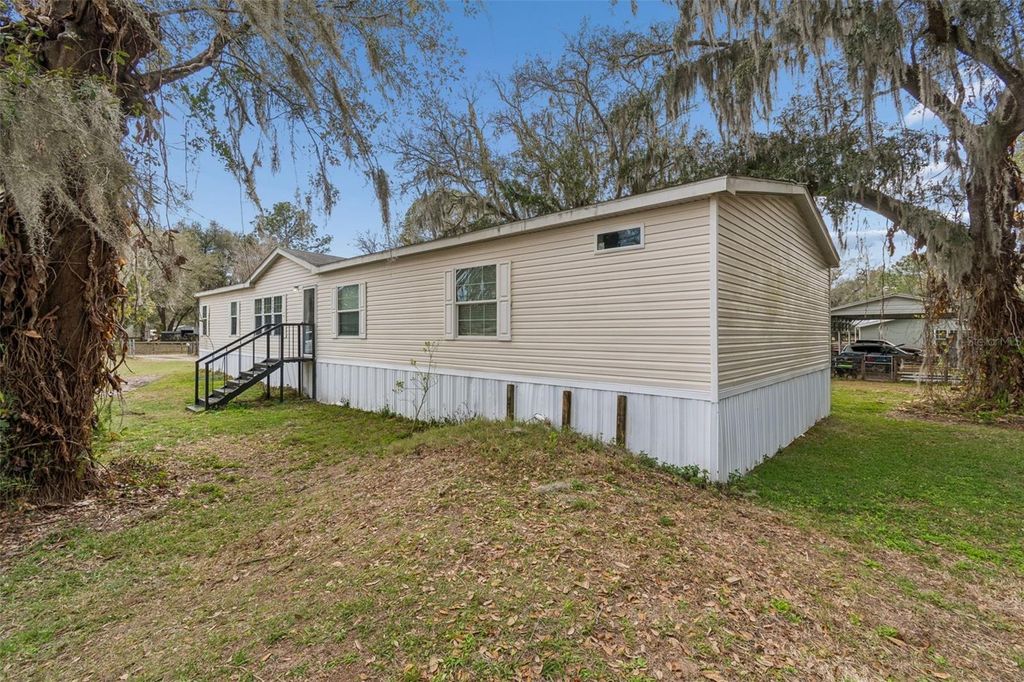 Photo of 27435 Holiday Drive, Dade City, FL 33525 (MLS # TB8483184)