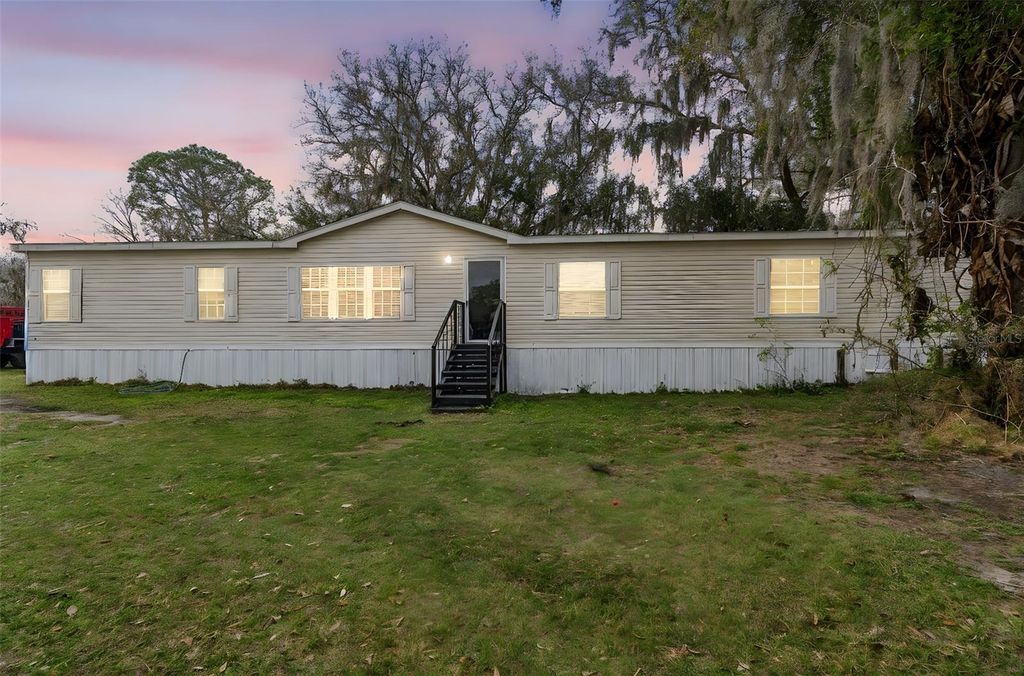 Photo of 27435 Holiday Drive, Dade City, FL 33525 (MLS # TB8483184)