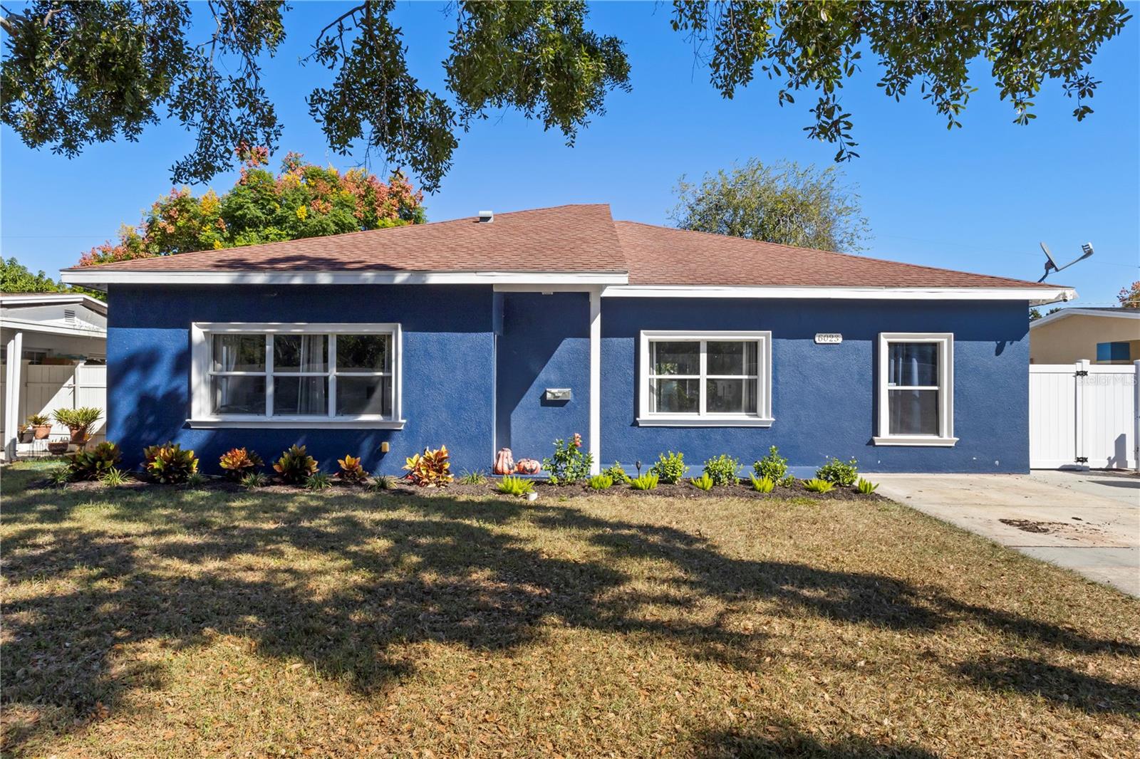 Discover the perfect blend of comfort, convenience, and opportunity in this beautifully maintained Town 'n' Country home. Ideally located just minutes from Tampa International Airport, the Westshore District, and downtown Tampa. The main residence offers a bright, warm, and welcoming atmosphere throughout. The standout feature? A private, attached in-law suite, complete with its own private entrance, kitchenette, and full bathroom, currently generating income as a short term rental! Its perfect for guests, extended family, or as a smart way to offset your mortgage. Both units are fully fenced in with their own yards, and both equipped with their own outdoors laundry facilities. With shopping, restaurants, beaches, and some top rates schools nearby, this home truly checks every box!