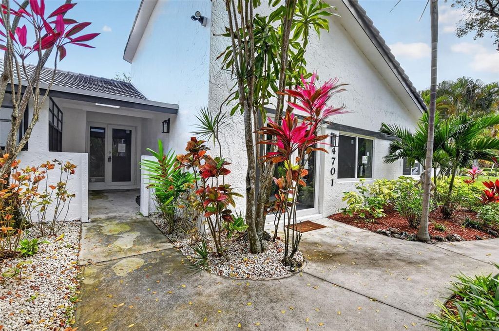 Photo of 4701 NW 1st Place, Deerfield Beach, FL 33442 (MLS # C7524878)