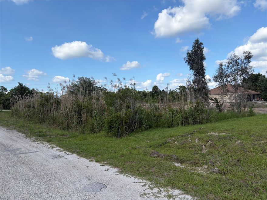 Corner lot to build your dream home in Lehigh Acres! This vacant lot at 2619 26th St W offers the perfect opportunity to design your ideal Florida lifestyle. Located in a growing neighborhood with new construction nearby, you’ll enjoy the convenience of shopping, dining, and schools just minutes away. Easy access to major roads makes commuting simple while still providing a quiet residential setting. Don’t miss this chance to secure your piece of Southwest Florida!