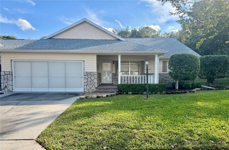 2 bedroom 2 bath end unit in Top Of The World, Ocala's premier active 55+ gated community.  New Roof 2021.  Nicely landscaped front yard. Covered front porch to enjoy your morning coffee. Open floor plan. Storm door. Kitchen island with breakfast bar.  Kitchen has extra counter space/cabinets and a large pantry.  Primary bedroom has large walk in closet and en suite bath with walk in shower. Large screened lanai and a rear patio.  2 car garage with opener.  Golf cart community.  On site restaurant.