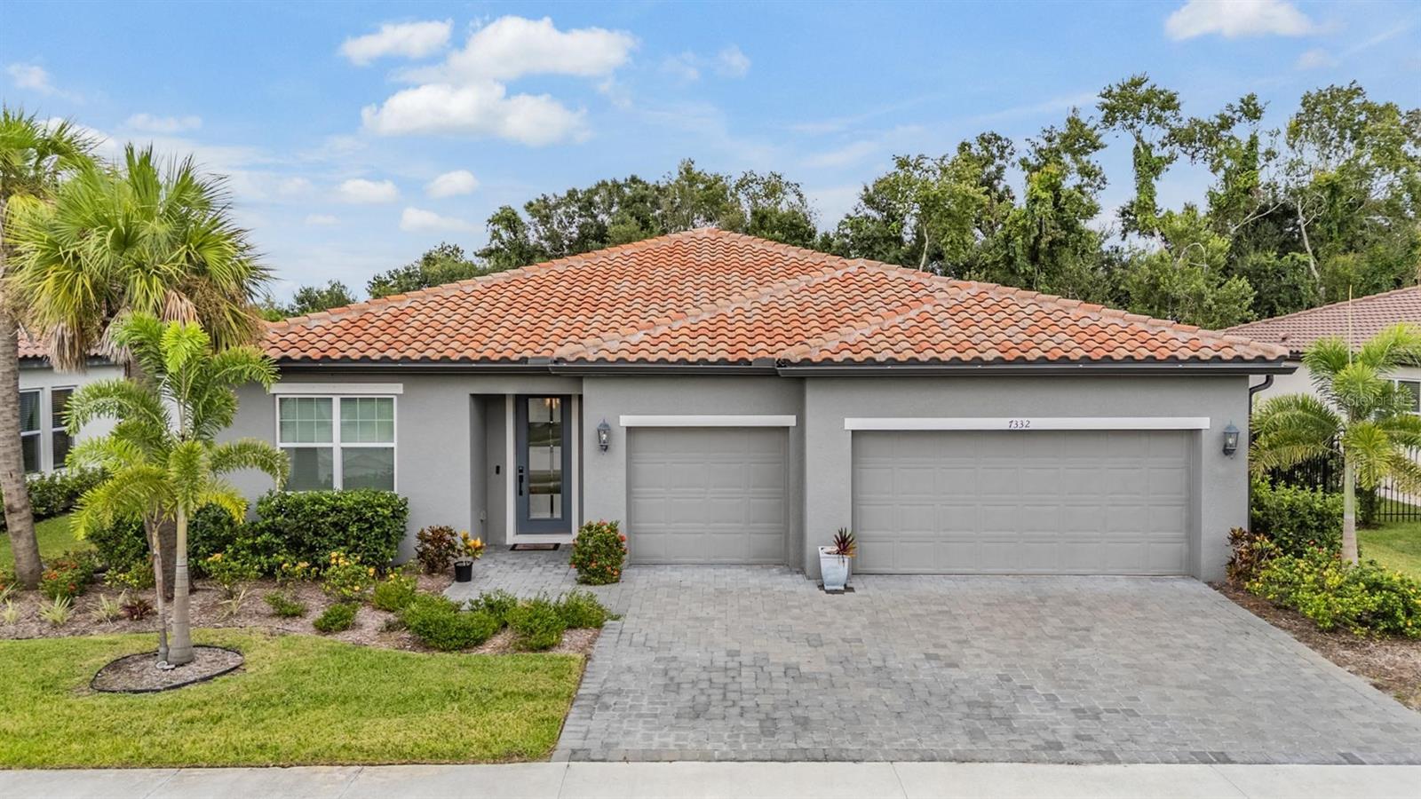 Welcome to your **solar-powered pool retreat** in the heart of Sarasota! This stunning home blends luxury, comfort, and sustainability with 3 spacious bedrooms, a versatile studio/den, and 2.5 beautifully updated bathrooms. Every inch is thoughtfully designed, from custom closets and elegant finishes to the show stopping open-concept kitchen with a large island, electric cooktop, and dual wall ovens. A 3-car garage adds convenience, while a free and clear state-of-the-art 41-panel, 15.99KW Tesla solar system, with a 13.5K Power wall battery and EV charger hookup delivers modern efficiency, ZERO ELECTRIC BILLS, and comes with a 25 year warranty. Step outside to your private oasis featuring a heated saltwater pool and spa wrapped in white travertine, overlooking peaceful preserve and estate views—the ultimate backdrop for relaxation or entertaining. Set within a sought-after Heron Landing gated community with **no CDD fees**, you’ll enjoy quick access to Highways in just under 5 minutes, A-rated schools, UTC Mall, and world-famous Siesta Key Beaches. More than a home, this is the lifestyle you’ve been waiting for—schedule your private tour today!