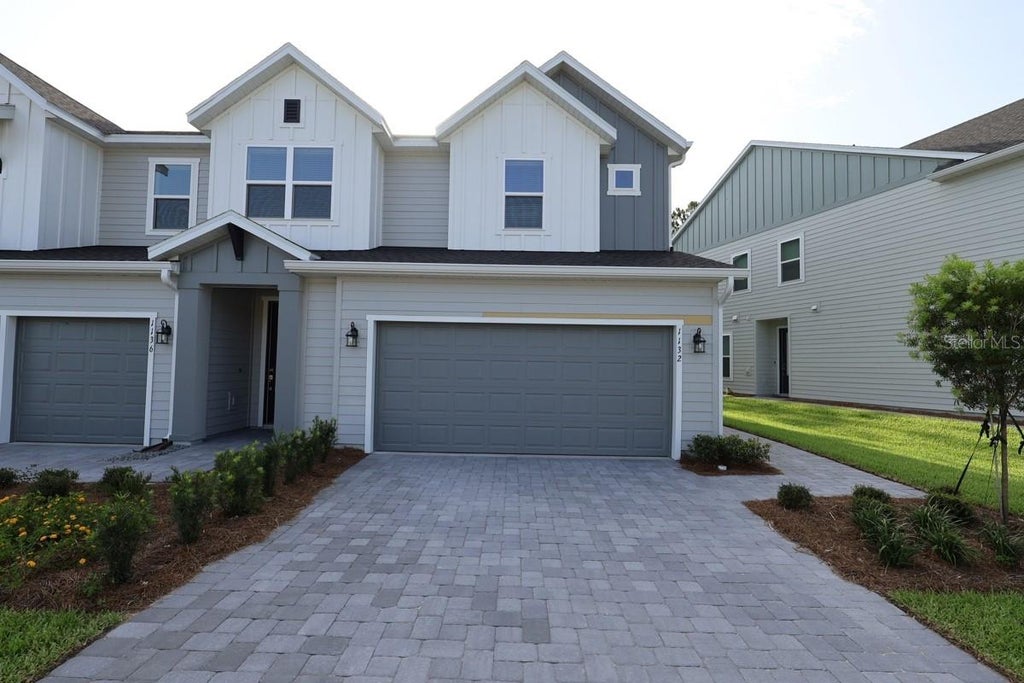 Photo of 1132 Wild Crest Lane, Daytona Beach, FL 32117 (MLS # TB8529024)