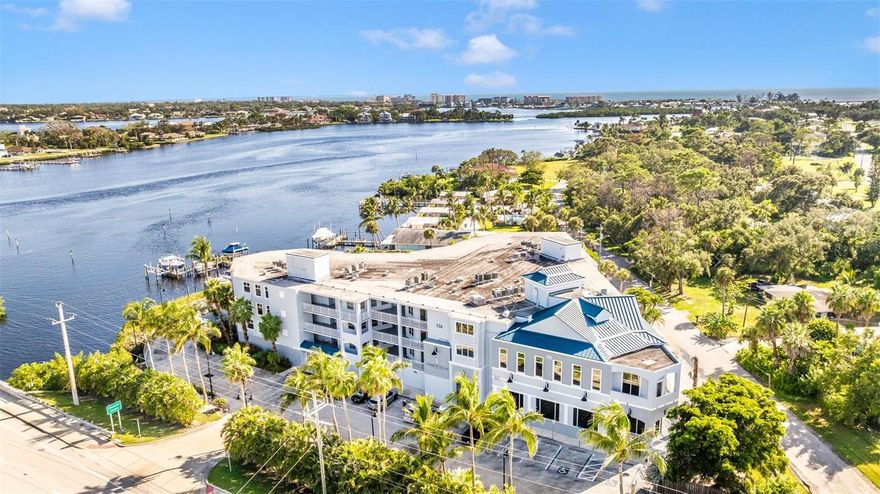 Discover waterfront luxury living at Harbor Villas at Doná Bay in this stunning 3-bedroom, 3.5-bath residence offering over 2,300 square feet of elegant space with high ceilings and Luxury Vinyl Plank flooring throughout. This home is being sold turn-key furnished with two bicycles and two kayaks and features an open floor plan with a spacious living and dining area that flows into a gourmet kitchen with pantry and table space, perfect for both entertaining and everyday living. Each bedroom has its own en-suite bath, while the master suite boasts sliding hurricane-rated glass doors that open to a private balcony overlooking Doná Bay, where you can enjoy tranquil sunrises and breathtaking sunsets on the water. The two front bedrooms overlook sunrise views on Shakett Creek. Designed with privacy in mind, the split layout provides comfort and functionality. Large Balcony with ceiling fans provides gorgeous saltwater views of Dona Bay. Community amenities include a heated pool, spa, fitness room on 4th floor, and 2 reserved parking spaces in secure garage on ground floor with bicycle rack and kayak storage, boat dock with kayak lift with direct access to the Intracoastal Waterway and Gulf to enjoy the sandbar, small islands and all salt water life has to offe r. Ideally located just minutes from Nokomis, Venice, and Sarasota beaches, this is not only convenien and beautiful, this offers life balance in one of Southwest Florida’s most desirable settings. All dock measurements and other measurements and information must be verified by buyer; info provided is approximate and to best knowledge of seller but seller makes no warranty.
