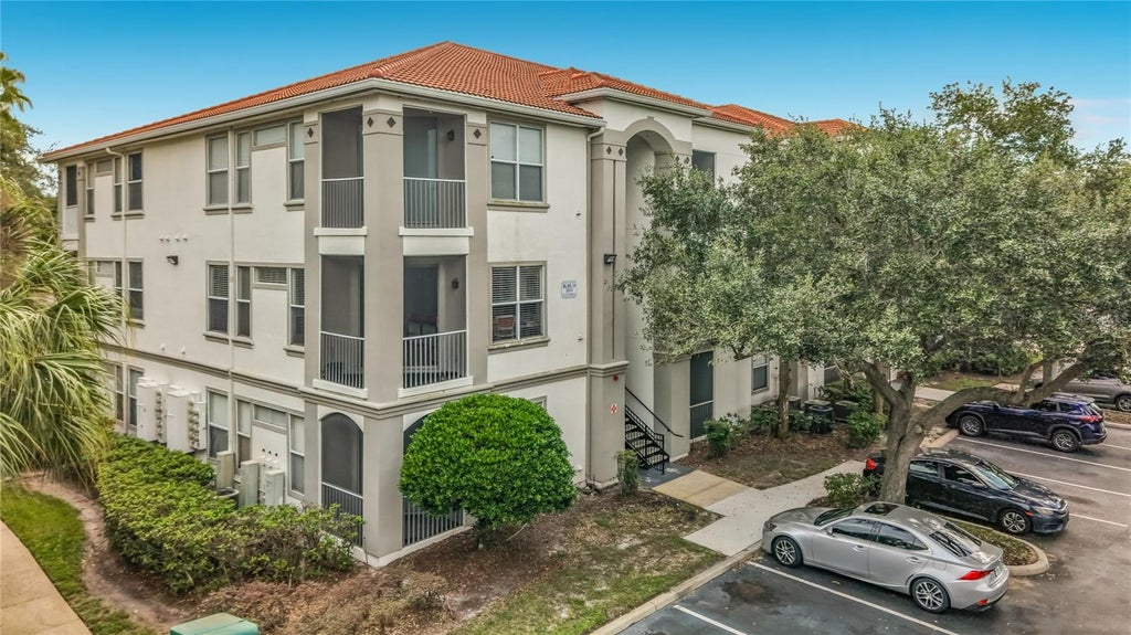Photo of 2513 Maitland Crossing Way #201, Orlando, FL 32810 (MLS # O6446839)