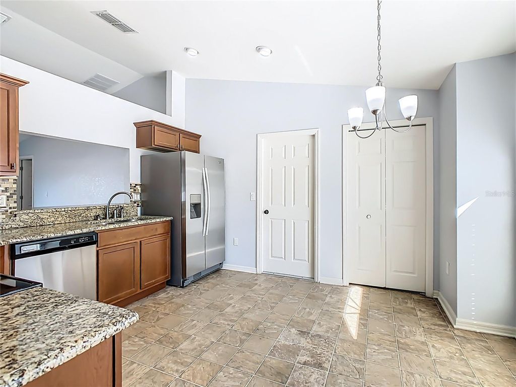 Photo of 931 Kingfisher Drive, Haines City, FL 33844 (MLS # O6384945)