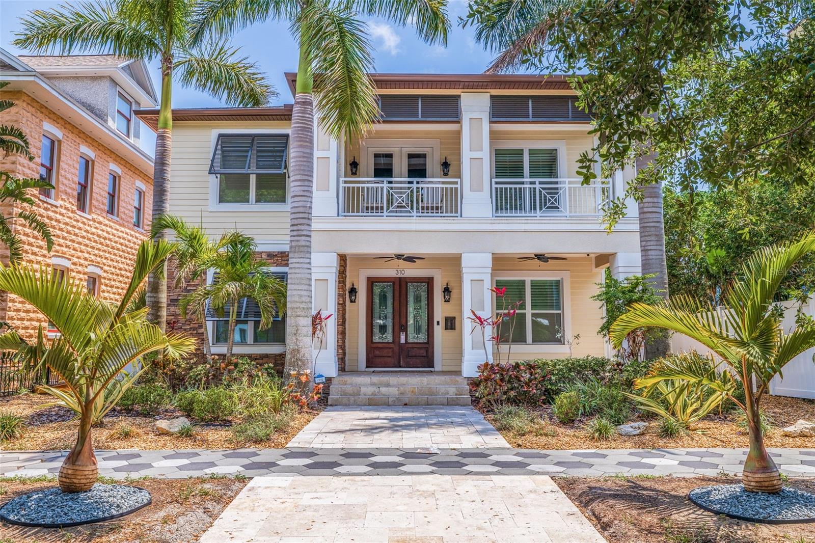 You Can Truly Have It All – Stunning Pool Home in the Heart of Old Northeast! Located just steps from vibrant Downtown St. Petersburg, this meticulously crafted 2017-built home offers the perfect blend of modern luxury and charm and is being offered fully furnished. Not only is this home a masterpiece, but it also boasts peace of mind with impact windows and doors—it sustained no damage and didn’t even lose power during the hurricanes. Designed with both comfort and style in mind, this 4-bedroom, 5-bathroom home features an open floor plan perfect for entertaining. The chef’s kitchen is a showstopper, complete with a 6-burner Wolf gas range, Subzero refrigerator, and an expansive 10-foot granite island—ideal for culinary creations or casual gatherings. The space flows seamlessly into three outdoor areas, including two upper covered decks and a lower screened patio, offering the ultimate spot for enjoying Florida’s beautiful weather. The tropical fenced backyard is an entertainer's dream, with a stunning pavered pool deck, heated pool and jacuzzi, creating a serene oasis for relaxation. Inside, a formal dining room with a cozy fireplace sets the stage for memorable family gatherings, while an upstairs bonus/flex space provides endless possibilities to suit your needs. This home is equipped with Control4 smart home technology, allowing you to effortlessly control lighting, climate, and security. Sonos speakers are built into every room for seamless music throughout the house, creating an immersive experience wherever you are. For added convenience, the home features a downstairs laundry room and additional laundry hookups upstairs. Every closet is outfitted with custom closet systems, offering both organization and luxury. Additional upgrades include plantation shutters, 8 foot doors and 10 foot + ceilings further enhancing the home’s charm. For added convenience, the AIR CONDITIONED two-car garage is accessed via an alley, ensuring privacy and ease. This home combines modern luxury with the timeless charm of Old Northeast, just a short stroll from downtown’s vibrant culture, dining, and entertainment. Rest easy knowing that this home is built to withstand the elements, offering both beauty and security. Don’t miss the opportunity to make this dream home yours. Schedule a private showing today! VIDEO--> https://ab3-visuals.aryeo.com/videos/01947528-2b89-716e-800e-f25d75a03308?v=364