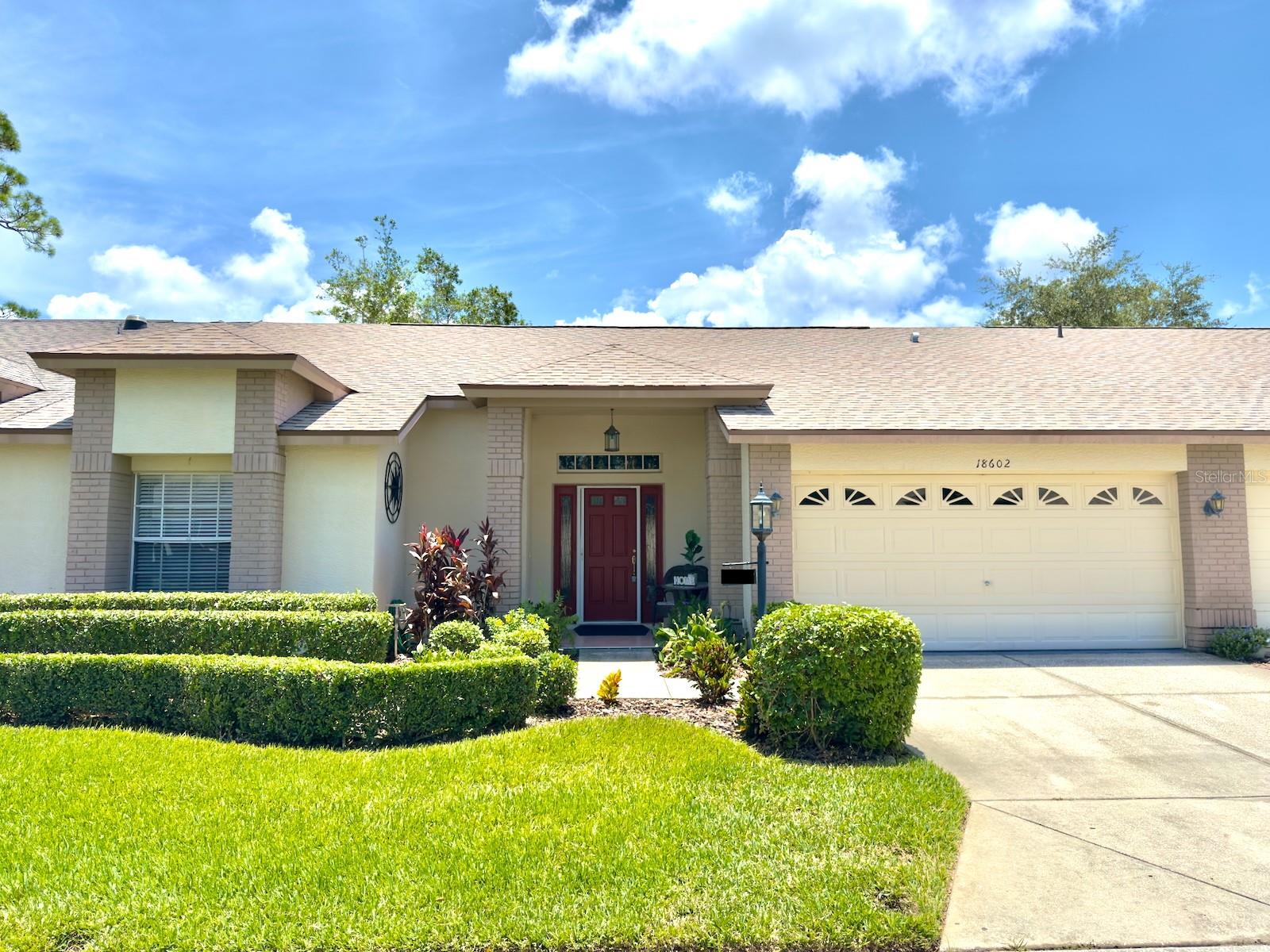 Welcome to your new turnkey villa in the highly sought-after Heritage Pines 55+ Golf Community. This beautifully maintained 2-bedroom, 2-bathroom villa offers a spacious and open split-bedroom floor plan with soaring ceilings that create a spacious feel. The open-concept layout seamlessly connects the family room, living room, and dining area—perfect for both everyday living and entertaining guests. The remodeled kitchen features granite countertops, updated cabinetry, a closet pantry, a breakfast bar, and a cozy dinette area. The primary suite boasts LVP flooring, dual walk-in closets, and a private en-suite bathroom complete with a walk-in shower, large vanity, and built-in makeup desk. The guest bedroom offers newer carpeting and its own spacious walk-in closet. Enjoy the convenience of an indoor laundry room, complete with built-in cabinets, a utility sink, and a washer and dryer included. Step outside to a screened-in patio overlooking a peaceful greenbelt—offering privacy and no rear neighbors. Major updates provide peace of mind, including a brand-new roof (June 2025), new HVAC system (2023), and water heater (2019). The foundation was professionally remediated and reinforced in 2024 and comes with a transferable lifetime warranty—fully insurable. Offered mostly furnished included (with the option to clear out upon request). Heritage Pines is a gated, amenity-rich community featuring a private 18-hole championship golf course, a heated pool and spa, clubhouse, fitness center, restaurant and bar, and courts for tennis, pickleball, bocce, and much more. HOA fees cover cable, internet, lawn care, irrigation, and exterior painting—making for a low-maintenance lifestyle. Be sure to check out the 3D virtual tour and schedule your private showing today.