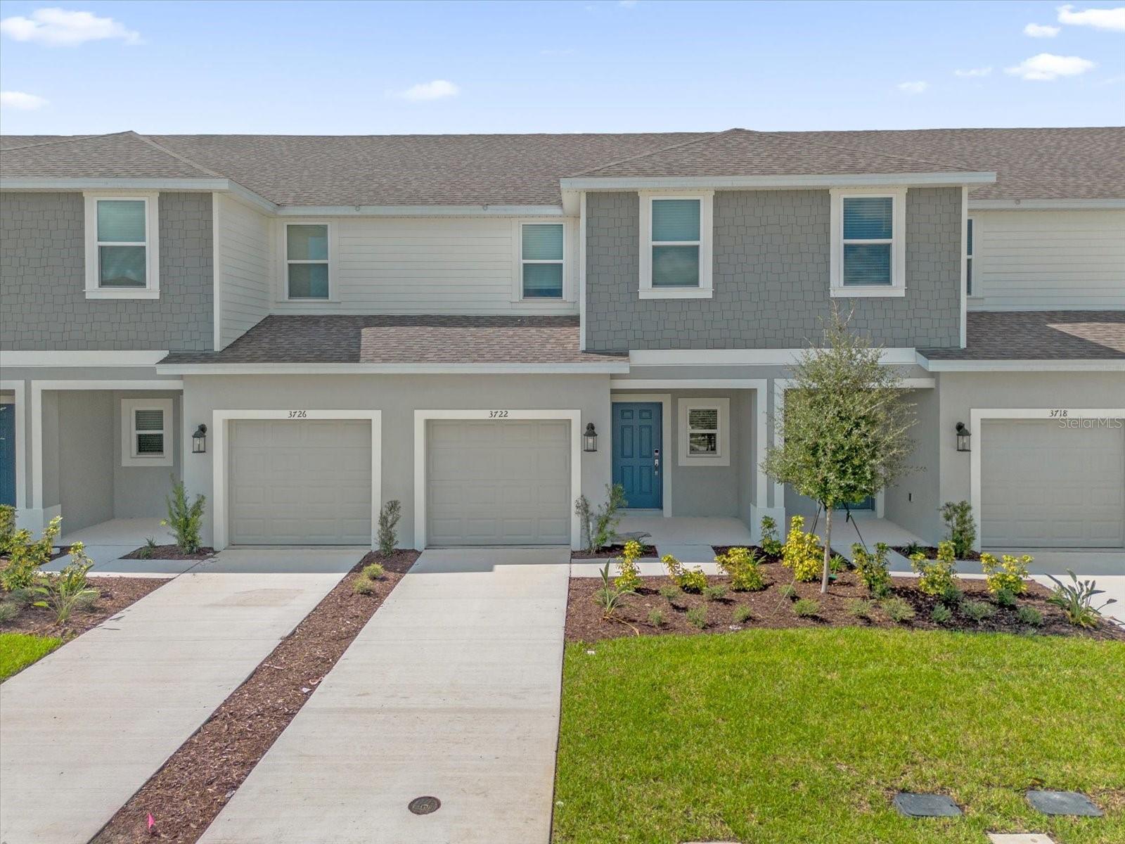 Jasmine townhome at The Townhomes at Westview! This
thoughtfully designed residence offers approximately 1,373 square feet of comfortable living space, a beautiful view of the lake, featuring three spacious bedrooms, two and a half baths, and a convenient one-car garage. As you step onto the inviting front porch and enter, you'll be greeted by a bright and open great room layout. The open kitchen, complete with a generous island, is perfect for gatherings and everyday dining, and offers beautiful views of the serene pond. The first floor also includes a half bath, the garage, and a large outdoor patio—ideal for relaxing or entertaining. Venture upstairs to find two well-sized bedrooms and a full bath, plus a luxurious primary suite with a walk-in closet and a double vanity bathroom. The convenient upstairs laundry area makes chores a breeze! This townhome is designed for modern living, with plenty of storage options including under-stair storage, a roomy pantry, a linen closet, and three bedroom closets. Upscale finishes such as quartz countertops, tile flooring on the main level, and an oversized kitchen island elevate the home's appeal. Don't miss your chance to make the Jasmine townhome your own! Schedule a viewing today !!