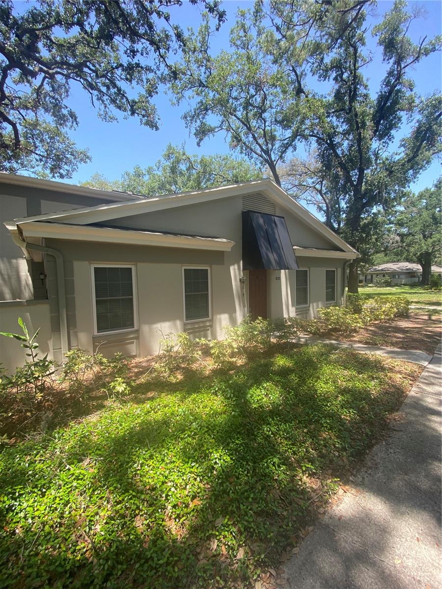 Tampa Gem! Raintree Manor 3 Bed / 2 Bath Condo with Resort Amenities. Your ideal home awaits in this well-maintained 3-bedroom, 2-bath Raintree Manor condo. Enjoy a prime location minutes from USF, I-75, Busch Gardens, shopping, and dining. Recent updates include new carpet on stairs and one upstairs bedroom, plus luxury vinyl in the other. A private, gated patio offers a tranquil outdoor space. Experience resort-style living with a community pool, tennis courts, and scenic walking paths. This is an opportunity you won't want to miss!