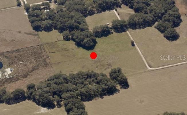 5 Acres of Fenced Country Land – Ready for Your Dream Build or Livestock. Nestled along a peaceful country road, this beautiful 5-acre property offers the perfect blend of privacy, nature, and functionality. Previously used for cattle, the land is fully fenced and ideal for bovines, equines, or your dream home. The property features: Electric service (SECO) already on site, 3" well in place for your water needs, gated access and open, usable land. With its lush, open pastures and quiet rural setting, you’ll instantly imagine yourself here, whether it’s building your forever home, creating a hobby farm, or expanding your agricultural pursuits. Come see it in person and experience the charm and potential of this slice of country living.