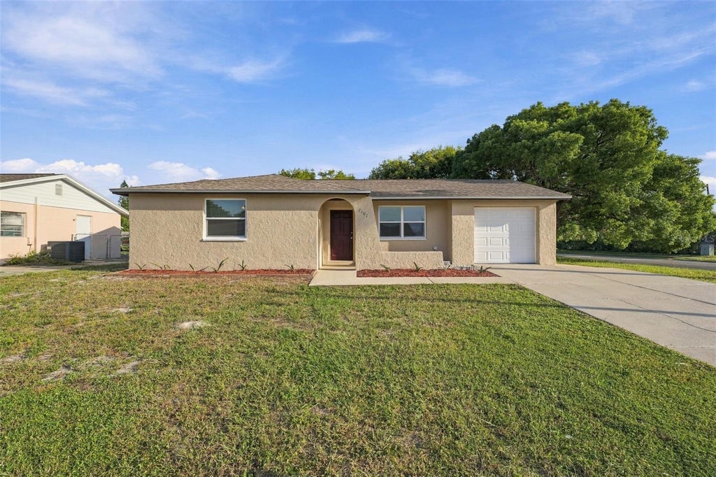 Photo of 7101 Fairfax Drive, Port Richey, FL 34668 (MLS # W7889890)
