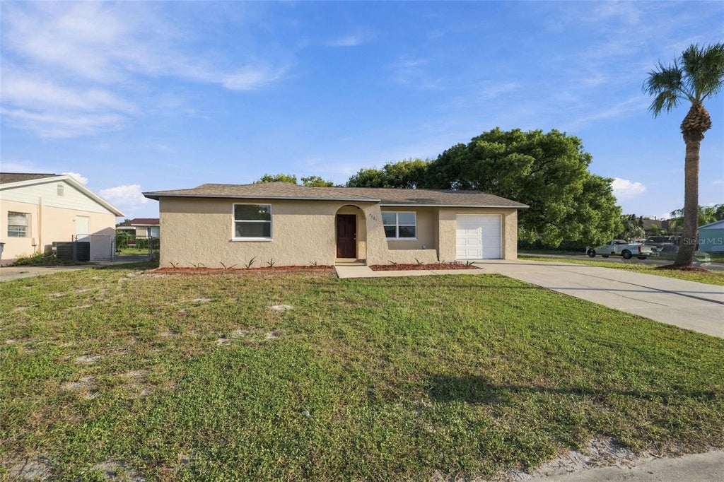 Photo of 7101 Fairfax Drive, Port Richey, FL 34668 (MLS # W7889890)